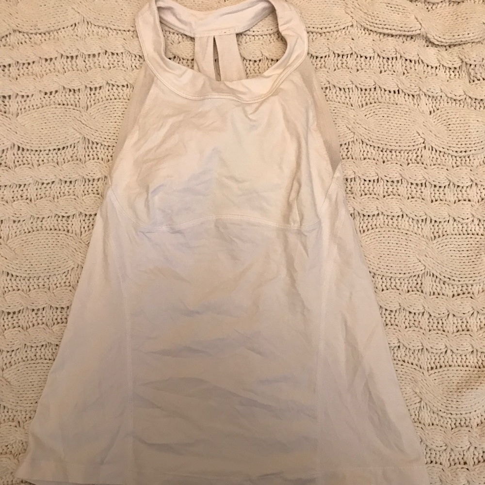 White Lululemon tank top.